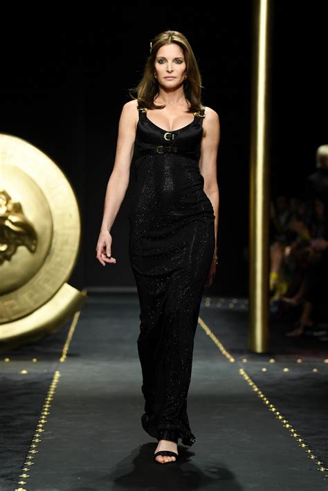 versace revived its bondage strap dress|gianni Versace gold dress.